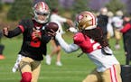 San Francisco quarterback Trey Lance, left, was back in his home state Wednesday for joint practices against the Vikings.