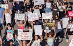 Hundreds of demonstrators marched in opposition to the U.S. Supreme Court’s decision overturning Roe v. Wade in downtown Raleigh, N.C., on June, 24,