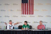 DFL Gov. Tim Walz, left, and GOP gubernatorial candidate Scott Jensen debated for the first time at Farmfest on Aug. 3. Moderating the debate was Bloi