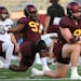 Gophers defensive end Thomas Rush (8) stretched during practice Aug. 11 at Huntington Bank Stadium.