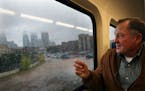 Roger Scherer, photographed riding the then-new Northstar commuter rail line in 2009, was a Metropolitan Council member.