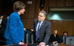 In 2017, Sen. Amy Klobuchar and then-Sen. Al Franken conferred during a break during the second day of Supreme Court nominee Neil Gorsuch’s confirma