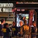 FBI agents gather at the scene of a deadly shooting, July 17, at the Greenwood Park Mall, in Greenwood, Ind. 