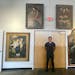 Revere Auctions co-founder Sean Blanchet in front of a collection of angel paintings from Aveda and Intelligent Nutrients founder Horst Rechelbacher t