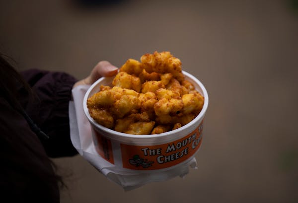 A bucket of piping hot cheese curds. ] JEFF WHEELER • jeff.wheeler@startribune.com The Minnesota State Fair presented what they called a Kickoff to 
