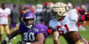 Fullback C.J. Ham, left, has thrived in a diverse role in Vikings offenses in recent seasons.