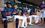 Minnesota Twins players joke around in the dugout ahead of their game against the Toronto Blue Jays Friday, August 5, 2022 at Target Field in Minneapo
