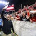 Georgia head coach Kirby Smart celebrated with fans after beating Alabama 33-18 in the College Football Playoff Championship Game on Jan. 10, 2022.