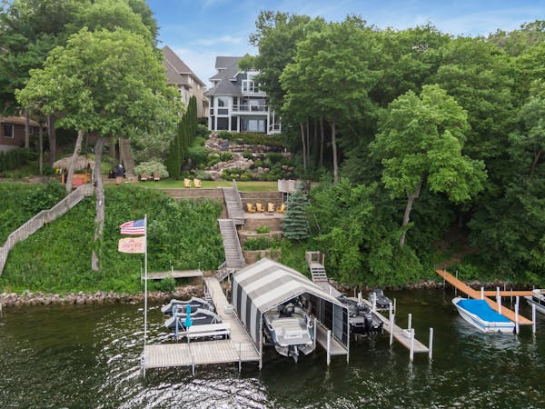 The four-story Cape Cod style house sits on a bluff overlooking Cook’s Bay on Lake Minnetonka. It has five bedrooms, seven bathrooms and more than 6