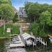 The four-story Cape Cod style house sits on a bluff overlooking Cook’s Bay on Lake Minnetonka. It has five bedrooms, seven bathrooms and more than 6