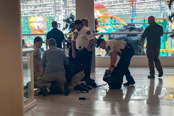 A man who was open carrying a weapon into the Mall of America was tackled and detained by authorities. 