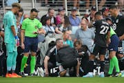 Athletic trainers tended to Minnesota United center back Bakaye Dibassy when he injured his right leg Saturday at Allianz Field.