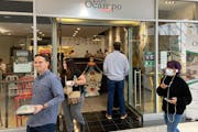 The lines were back at Los Ocampo restaurant during the lunch hour Tuesday at City Center in Minneapolis. About 55% of downtown workers have returned 