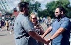 Sam Ward and Ryan Wooldridge exchanged vows under the Great Big Wheel on the first Friday of the Minnesota State Fair.