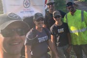 Paul Davis, second from left, on a 100-mile ruck he completed with two other veterans last year to raise money for Project Got Your Back.