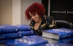 Pulitzer Prize-winning investigative journalist Nikole Hannah-Jones signed books before taking the stage to discuss her new book, “The 1619 Project: