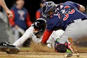 Marwin Gonzalez of the Yankees was tagged out by Twins catcher Sandy Leon in Game 2 on Wednesday.