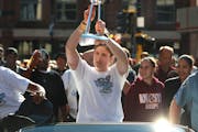 Lindsay Whalen, above holding up the WNBA championship trophy after the Lynx won their first title in 2011, will be inducted into the Naismith Memoria