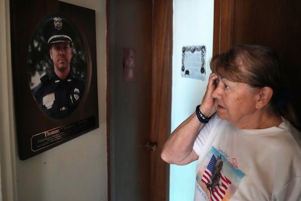 Rosella Decker looked at a photo of her son Thomas Decker at her home in Cold Spring, Minn. “There’s no such thing as closure,” she said. “To 
