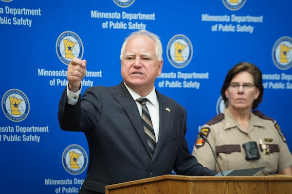 Minnesota Gov. Tim Walz, speaking here at a July press conference inside the state Bureau of Criminal Apprehension, is touting his support for law enf