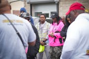 Community members gathered Friday between Winner Gas and Merwin Liquors in north Minneapolis in an attempt to shut them down after a shooting nearby. 