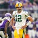 Green Bay Packers quarterback Aaron Rodgers (12) reacts after a Minnesota Vikings defensive stop on fourth down Sunday.