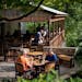 Craig and Mary Kantenwein dine on one of Juniper’s outdoor spaces this summer in Lanesboro.