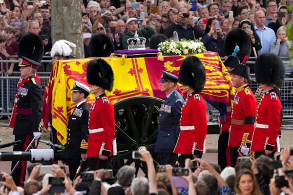 Queen's coffin leaves Buckingham Palace