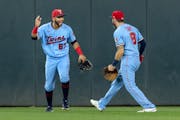 Gilberto Celestino and Jake Cave of the Twins had plenty to celebrate after winning a second consecutive game over the Royals, 4-0 on Wednesday.