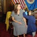 Lt. Gov. Peggy Flanagan exhaled before receiving her variant-specific COVID-19 vaccine booster at the State Capitol on Friday from nurse Barb Salzman.