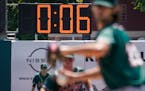 Pitch clocks are used in minor league baseball like in this game between the Brooklyn Cyclones and Greensboro Grasshoppers in July.