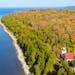 An aerial view of Eagle Bluff Lighthouse during the fall season in Wisconsin’s Peninsula State Park.