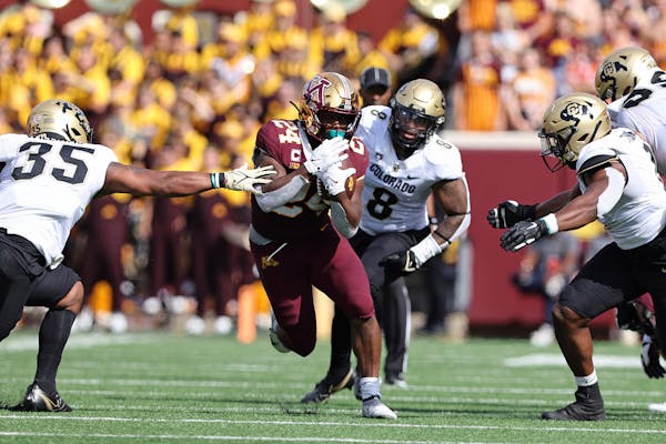 Minnesota running back Mohamed Ibrahim (24) carries the ball against Colorado during the first half of an NCAA college football game, Saturday, Sept. 