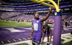 Vikings running back Dalvin Cook (4) yells to a fan before the Vikings-Packers game earlier this month.