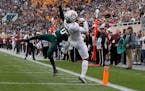 A sign of things to come: Daniel Jackson caught a pass for a touchdown against Michigan State during the first quarter Saturday in East Lansing, Mich.