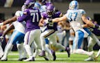 Detroit rookie Aidan Hutchinson was rendered invisible by Vikings Brian O’Neill and Christian Darrisaw on Sunday.