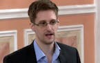 FILE - In this image made from video and released by WikiLeaks, former National Security Agency systems analyst Edward Snowden speaks in Moscow, Oct. 