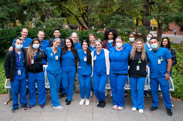 Mental health coordinators at Abbott Northwestern Hospital in Minneapolis posed for a group picture shortly after voting to unionize in October 2021.