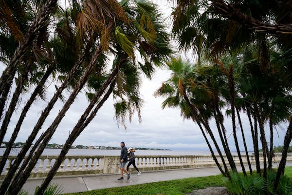 The outer bands of Hurricane Ian moved toward shore in Tampa, Fla., on Wednesday.