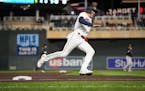 Twins left fielder Jake Cave runs home on a double by right fielder Matt Wallner in the bottom of the second inning Wednesday.