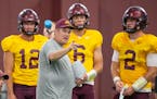 Offensive coordinator Kirk Ciarrocca worked with the Gophers quarterbacks last month, including starter Tanner Morgan (2).