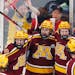 Gophers forward Matthew Knies, center, is one of two Olympians returning to the roster this season.