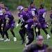 Adam Thielen (center) and other Vikings participated in their one and only practice in England this week on Friday.