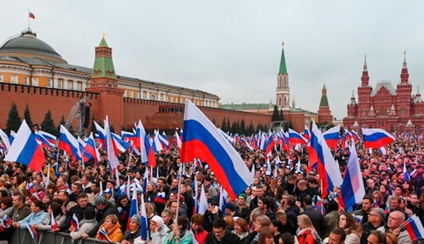 People gathered in Moscow during celebrations marking the incorporation of regions of Ukraine to join Russia on Friday. 