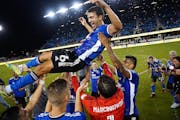 Earthquakes players lifted up veteran midfielder Shea Salinas after Saturday night’s 2-0 victory over Minnesota United. The 36-year-old Salinas, who