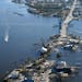 The bridge leading from Fort Myers to Pine Island, Fla., is seen heavily damaged in the aftermath of Hurricane Ian on Pine Island, Fla., Saturday, Oct