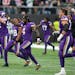 Vikings players, including Dalvin Cook (4), celebrated the 28-25 victory over the Saints in London.