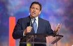 Florida’s Republican Gov. Ron DeSantis addresses attendees during the Turning Point USA Student Action Summit, Friday, July 22, 2022, in Tampa, Fla.