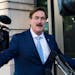 MyPillow chief executive Mike Lindell, speaks to reporters outside federal court in Washington, June 24, 2021.