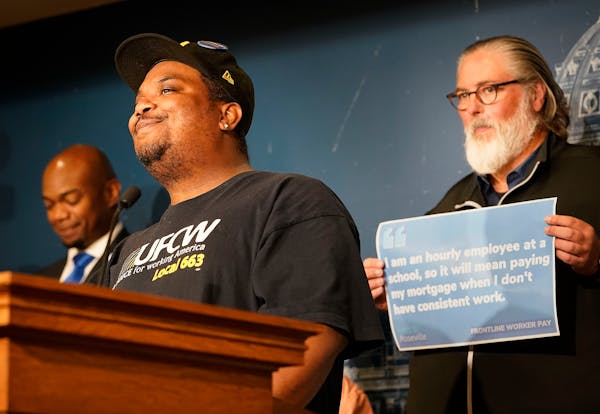 Frontline worker Keith Farr, a meat cutter at Lunds & Byerlys, spoke during a news conference at the State Capitol announcing Frontline Worker Pay of 